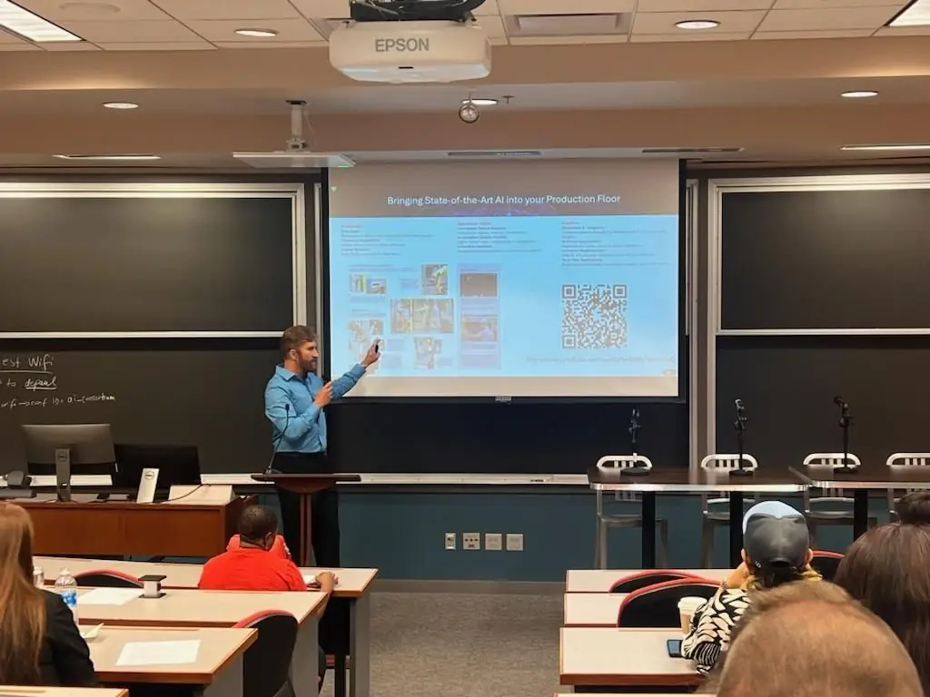 Konrad Konarski leading a session on bringing state-of-the-art AI into the production floor