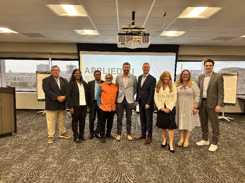 Symposium participants at the close of the Applied AI Symposium at Texas A&M University